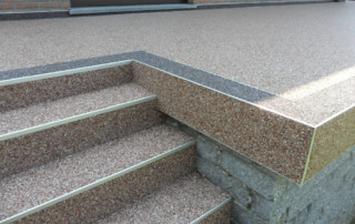 Steinteppich-Verlegung
